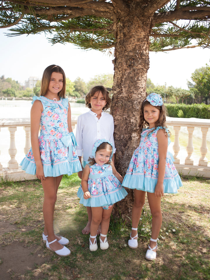 Jesusito con Capota y Braguita Flores Turquesa y Rosa